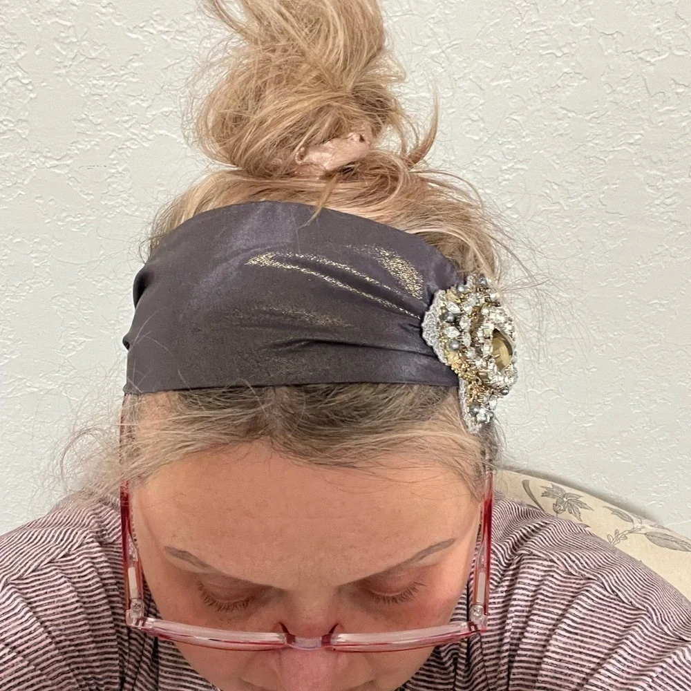 Headband, sparkling fabric and stunning brooch